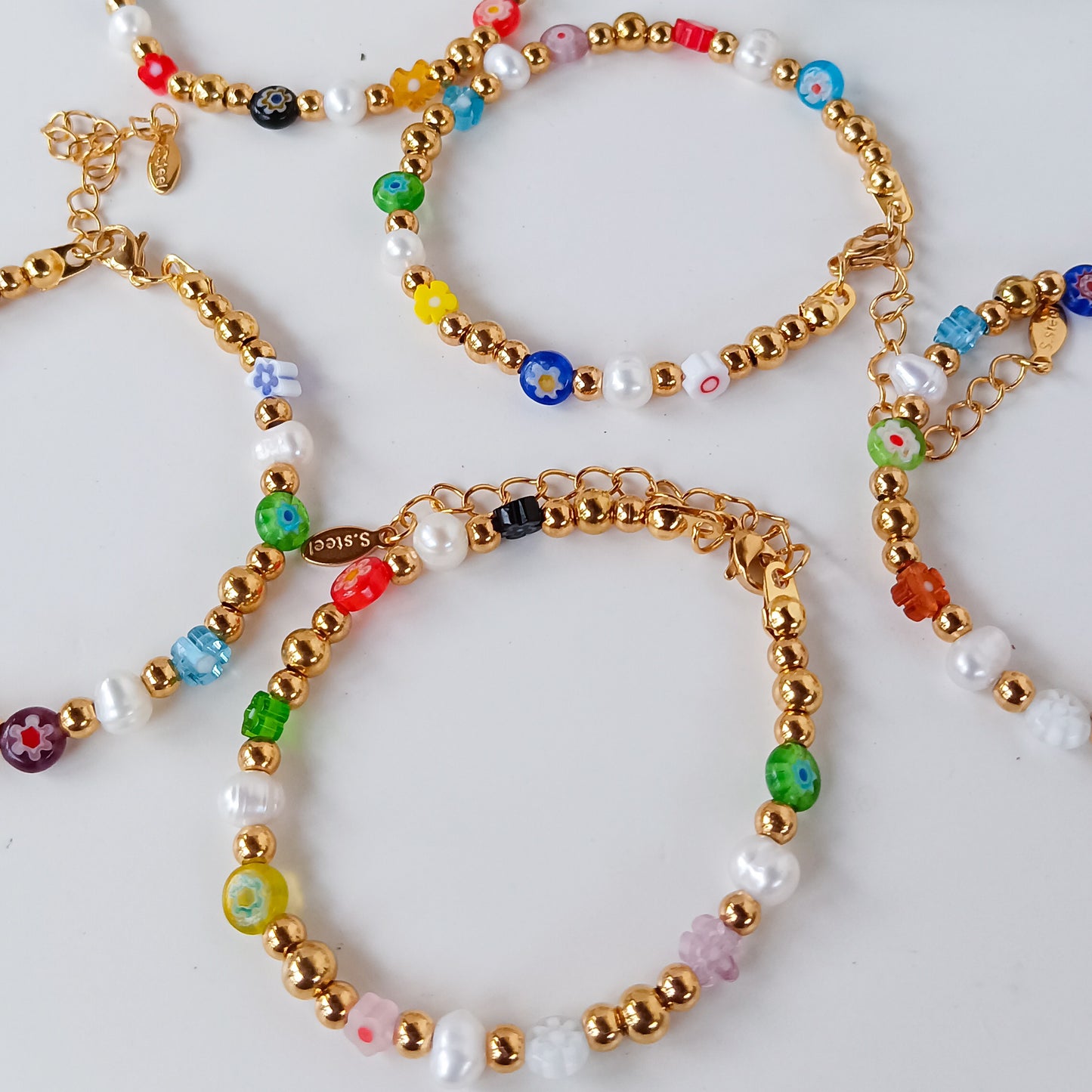 Beaded gold bracelet with pearl and millefiori beads
